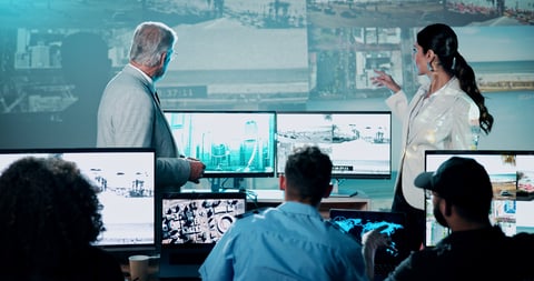 Surveillance operators monitoring live CCTV footage